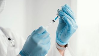 doctor-getting-ready-a-vaccine-for-a-patient