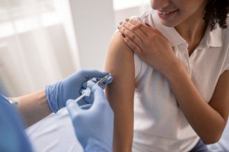 doctor-vaccinating-a-patient-in-a-clinic